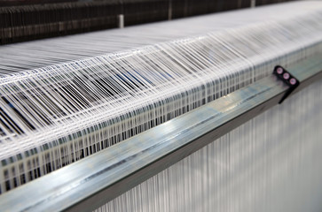 Weaving automatic machines - Weaving is a method of textile production in which two distinct sets...