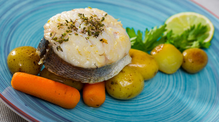 Pollock steak with vegetables