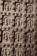 Decorative motif in the form of horseshoes at the gate of the fortress of Aleppo. Syria