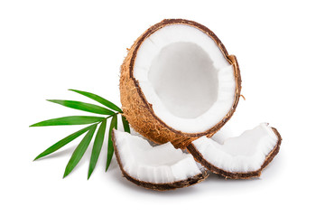 half of coconut with leaves isolated on white background