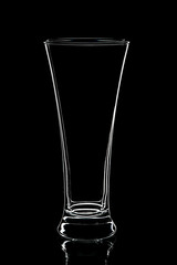 Empty glass isolated on black background. 