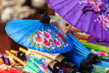 Beautiful handmade umbrellas for sale in the local market at northern Thailand.