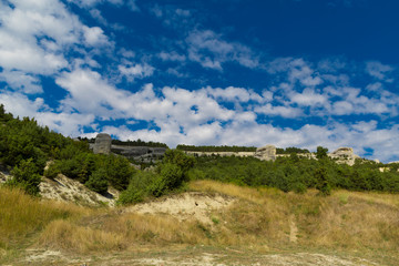 Fototapeta na wymiar Mountain landscape with blue sky and clouds