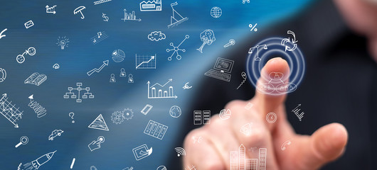 Man touching business doodles