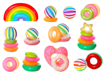 Set of different bright inflatable beach accessories for swimming on white background