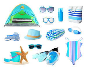 Set of different beach accessories on white background