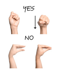 Woman showing words Yes and No on white background, closeup of hands. Sign language
