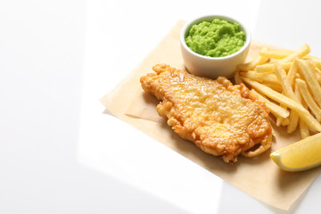 British Traditional Fish and potato chips on white background