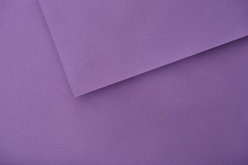 top view of violet paper sheets with copy space