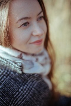 Portrait of a girl on a sunny day in the forest.