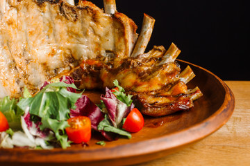 Grilled Pork Rib Meat on Top of clay plate.