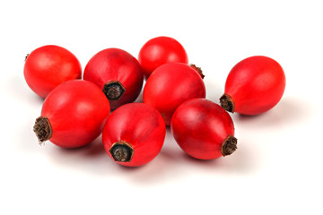Rosehips (dog rose fruits) isolated on white background.