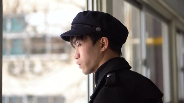 Japanese Railway Station Staff Signaling to Train with Hand Movements From Control Bridge