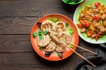 Sichuan food. Cina. Cina. Chinese meat pie - xian bing. Panfried. Tofu and peppers. Green beans with walnuts.