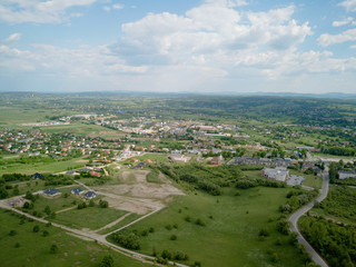 Panorama of the mestain near the town of Jaslo in Poland from a bird's eye view. Aerial photography of landscapes and settlements. Urbanization of the country. Living environment of people