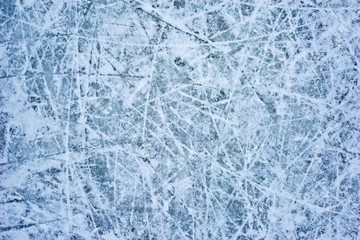 Ice surface on the skating-rink with snow.