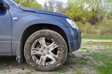 Fototapeta na wymiar Wheels SUV in the mud