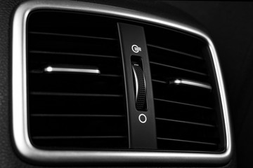 Obraz premium Details of air conditioning car ventilation system in modern car.