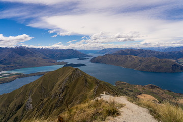 Obraz premium amazing view from Roys peak in wanaka New Zealand, great landscape in wanaka Roys peak, landscape photography in New Zealand, New Zealand landmarks, place to go in wanaka