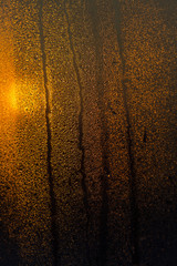 water drops on the glass surface at sunset, macro