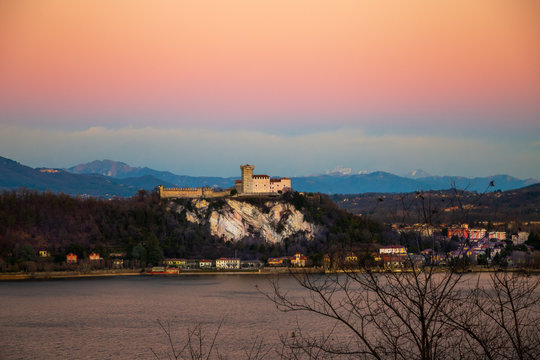 View of the Angera fortress at sunset