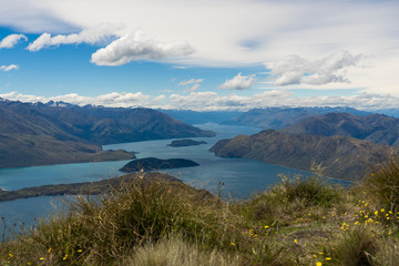 Fototapeta premium amazing view from Roys peak in wanaka New Zealand, great landscape in wanaka Roys peak, landscape photography in New Zealand, New Zealand landmarks, place to go in wanaka