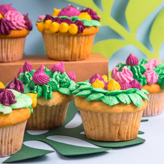Creative dessert muffin with colorful cream decoration