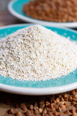 Healthy diet superfood buckwheat groats and flour used for making delicious pasta, noodles, pancaces and kasha in many countries.