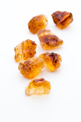 Brown caramelized sugar on white background.