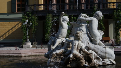 Naklejka premium Ancient ornamental statues silhouette fountain in Bad Ischl