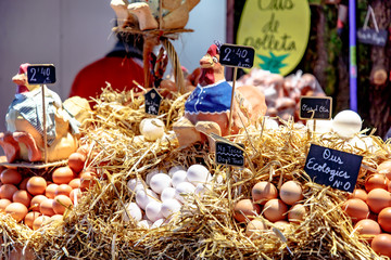 Shop at the market with eggs. A lot of eggs in the package.