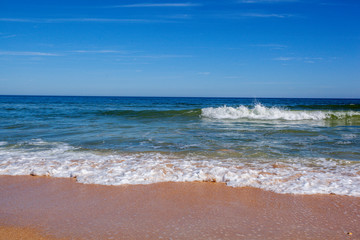 Beach Shore Water Coming in Sand Ocean Landscape Sunny Daytime Vacation Warm Tropical Weather Environment