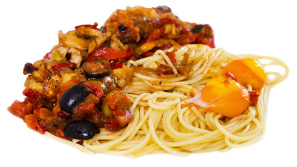pasta with vegetables grilled meat and two baked egg yolk on white plate