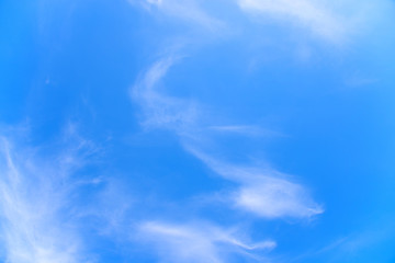 Obraz premium Fluffy white clouds on blue sky.