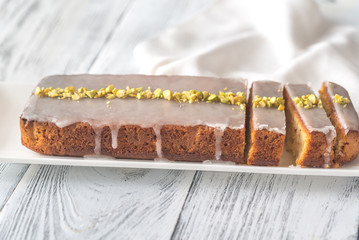 Lemon cake decorated with pistachios