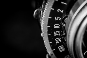 closeup of a lens of analogue camera. instantaneity  settings concept 