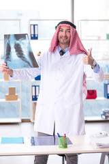 Arab doctor radiologist working in the clinic