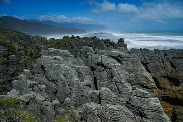 Fototapeta na wymiar Punakaki Pancake Rocks in Paparoa National Park, West Coast, South Island, New Zealand, overview at the pancake rocks, near Fox Glacier