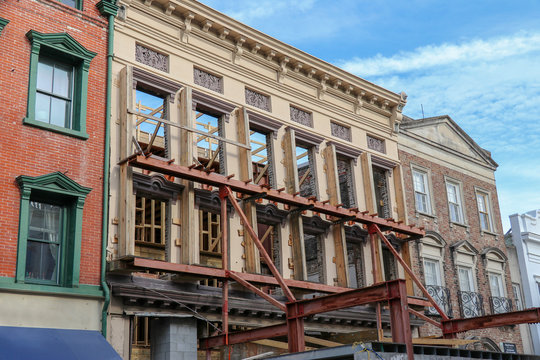 wall support on an old building facade for a historic preservation construction project in downtown Charleston, South Carolina