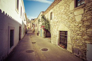 desolate street with vintage effect and houses in the Mediterranean
