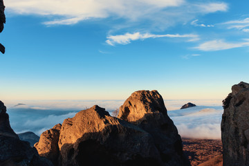 Fototapeta premium rock high in the mountains above the clouds