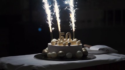 50th years anniversary celebration cake with fireworks