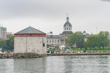 Fototapeta na wymiar Shoal Tower by the harbor with the city hall