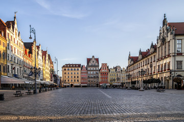 Fototapeta na wymiar Empty Market Square early in the morning, copy space. Wroclaw, historical old town, Poland.