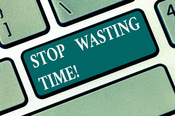 Writing note showing Stop Wasting Time. Business photo showcasing doing something that unnecessary does not produce benefit Keyboard key Intention to create computer message pressing keypad idea