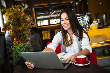 Business woman using laptop