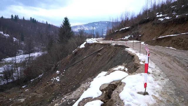 Man watching landslide road - (4K)