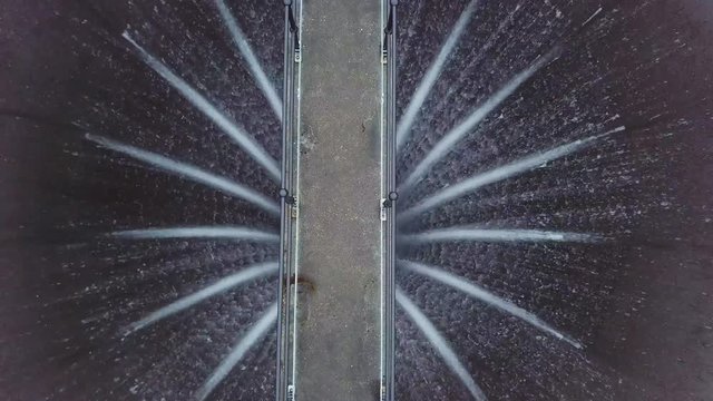 Aerial birds eye view of a bridge running over the impressive Gleann Dubh Reservoir near Barcaldine, Scotland