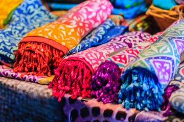 Beautiful Tie dye shirts and fabric for sale in night market at Bangkok, Thailand