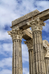 High cliffs along Falesia Beach and The Atlantic Ocean in Albufeira, Algarve, Portugal. Sunny summer day, blue sky with stormy clouds. Vertical image. Vertical image.